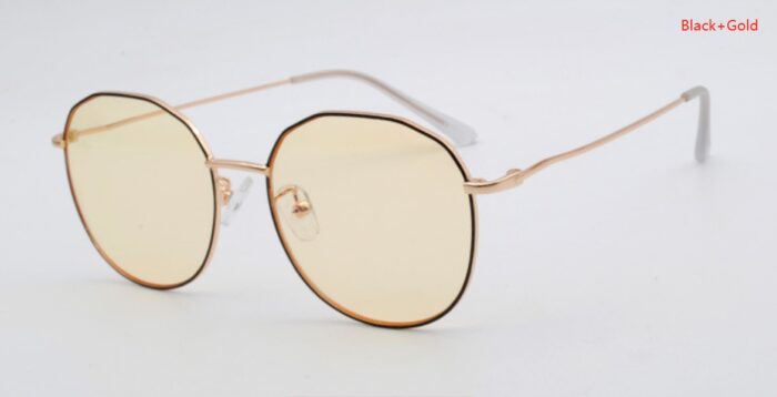 Black and gold geometric sunglasses with yellow lenses