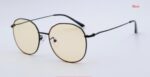 Black geometric sunglasses with yellow lenses