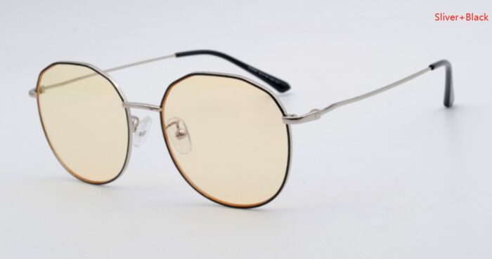 Silver and black polygon sunglasses with yellow lenses