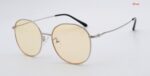 Silver geometric sunglasses with yellow lenses